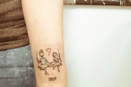 Deze 20 originele tattoos vieren de band tussen ouders en hun kind